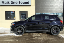 Black 2019 Mitsubishi RVR with dark privacy window tint installed in North Bay Ontario